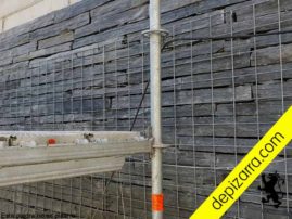 Paredes de piedra con malla.