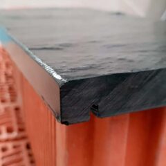 Cubremuros con dos canales goterón.