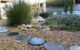 Jardines con grava, vegetación y piedra natural